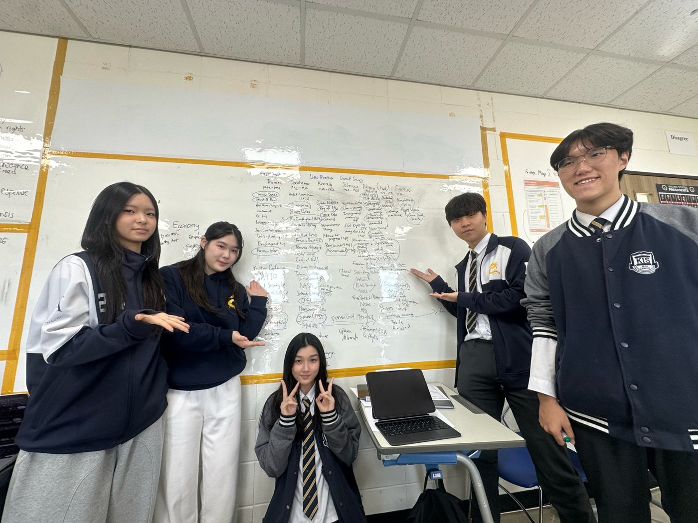 Team in front of a whiteboard